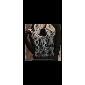 Black hoodie with hillarious writing , drawstring hood & light weight . Tag say